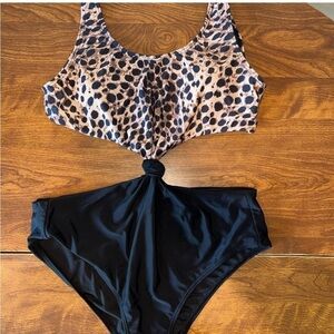 Pink Lily Animal Print top w/black bottom “one piece” size L